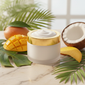 Sunshine Soufflé Moisture Lotion with coconut and mango butter in a frosted glass jar